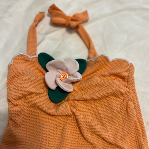 Janie and Jack Textured Orange Melon Halter One Piece Bathing Suit with Flower - Picture 3 of 3